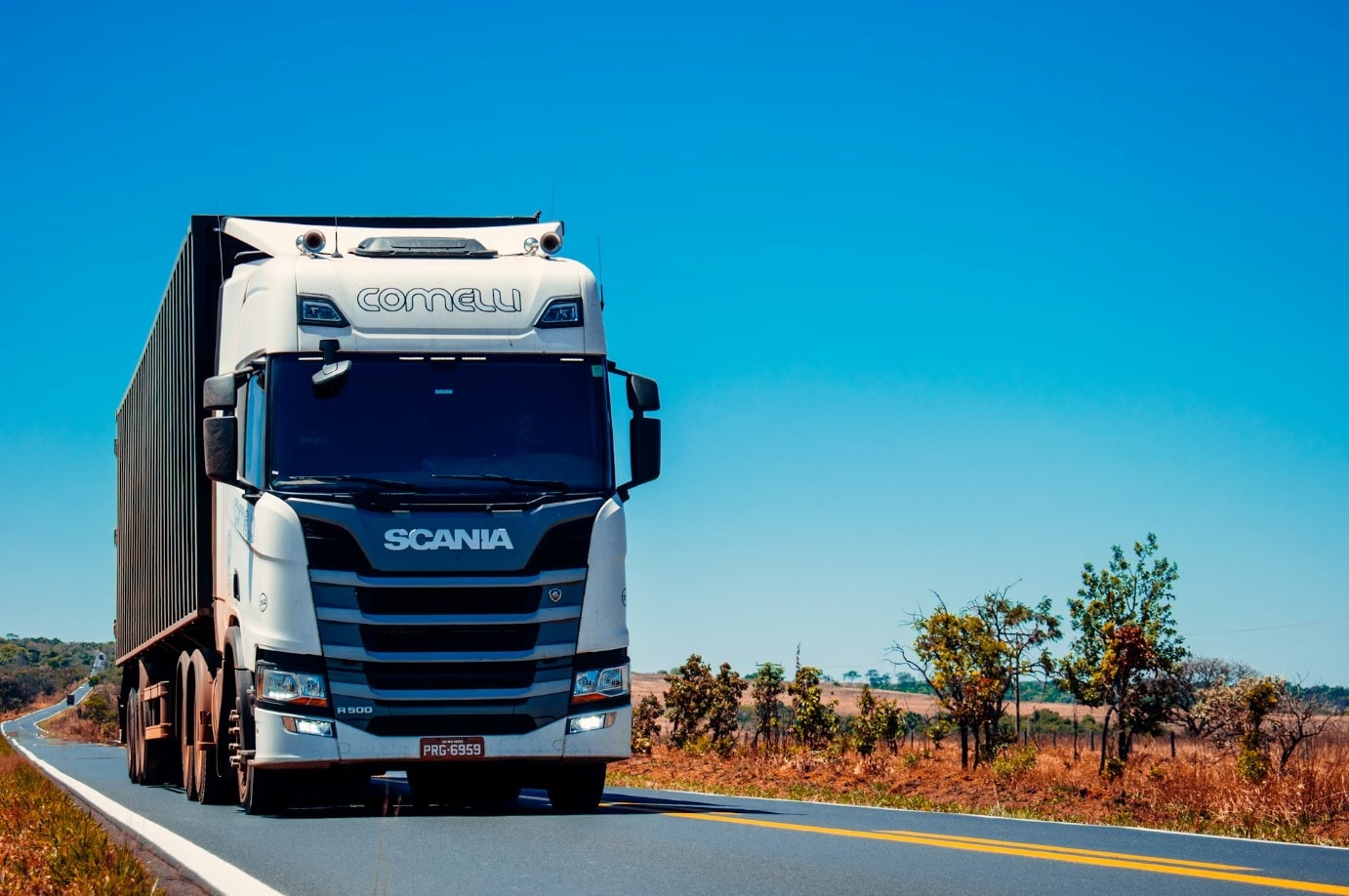 Commercial distribution trucks on operational route
